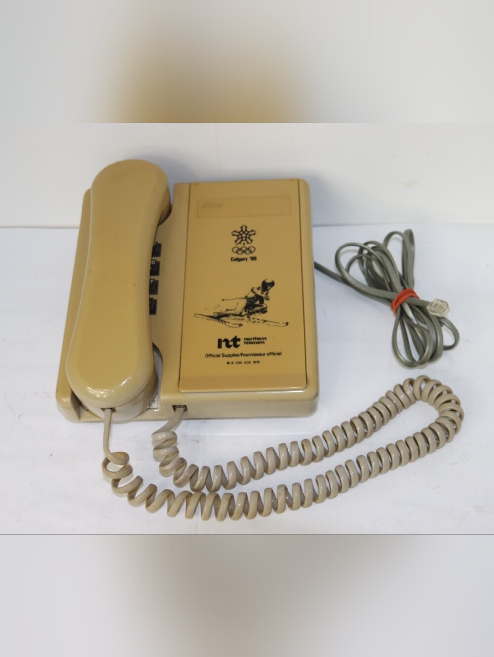 Vintage Beige Landline Phone with Olympic Graphic Calgary '88